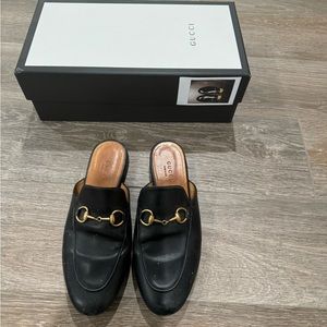 Used Gucci leather slides.  Size 35